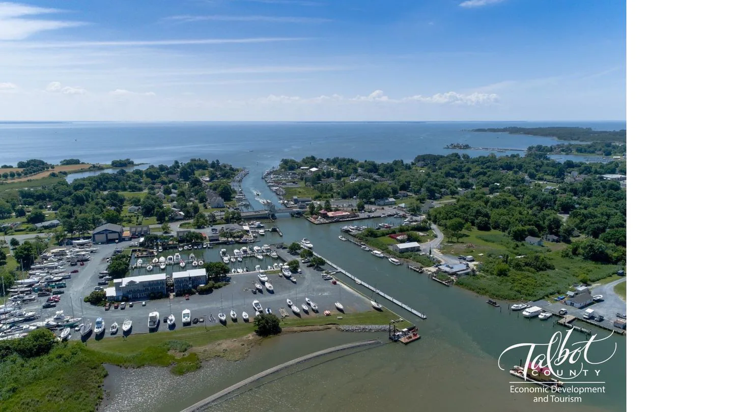 Aerial view of Tilghman Island harbor, marina and channel on a sunny day
