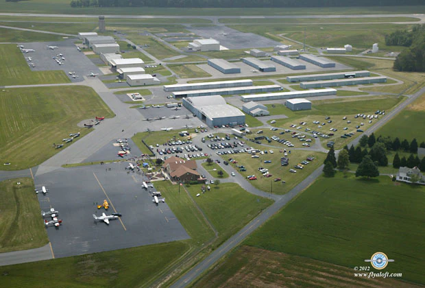 Aerial view of Easton airport with hangars, parked aircraft and parking areas