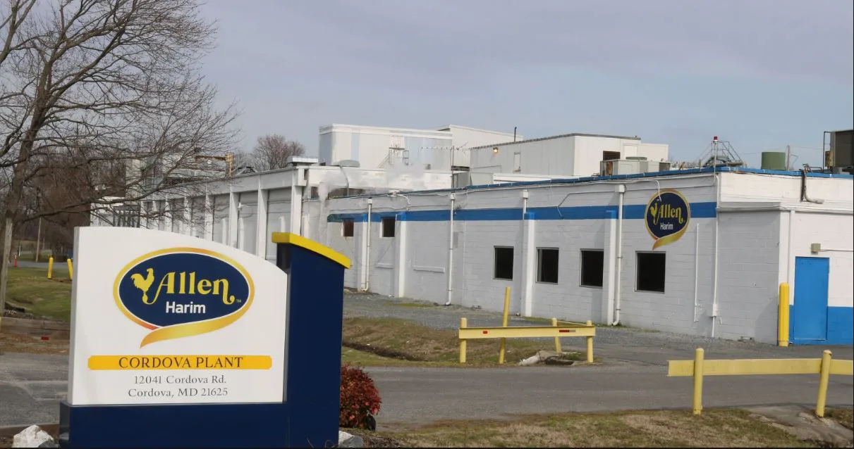Allen Harim Corinna Plant sign in front of a white processing plant building