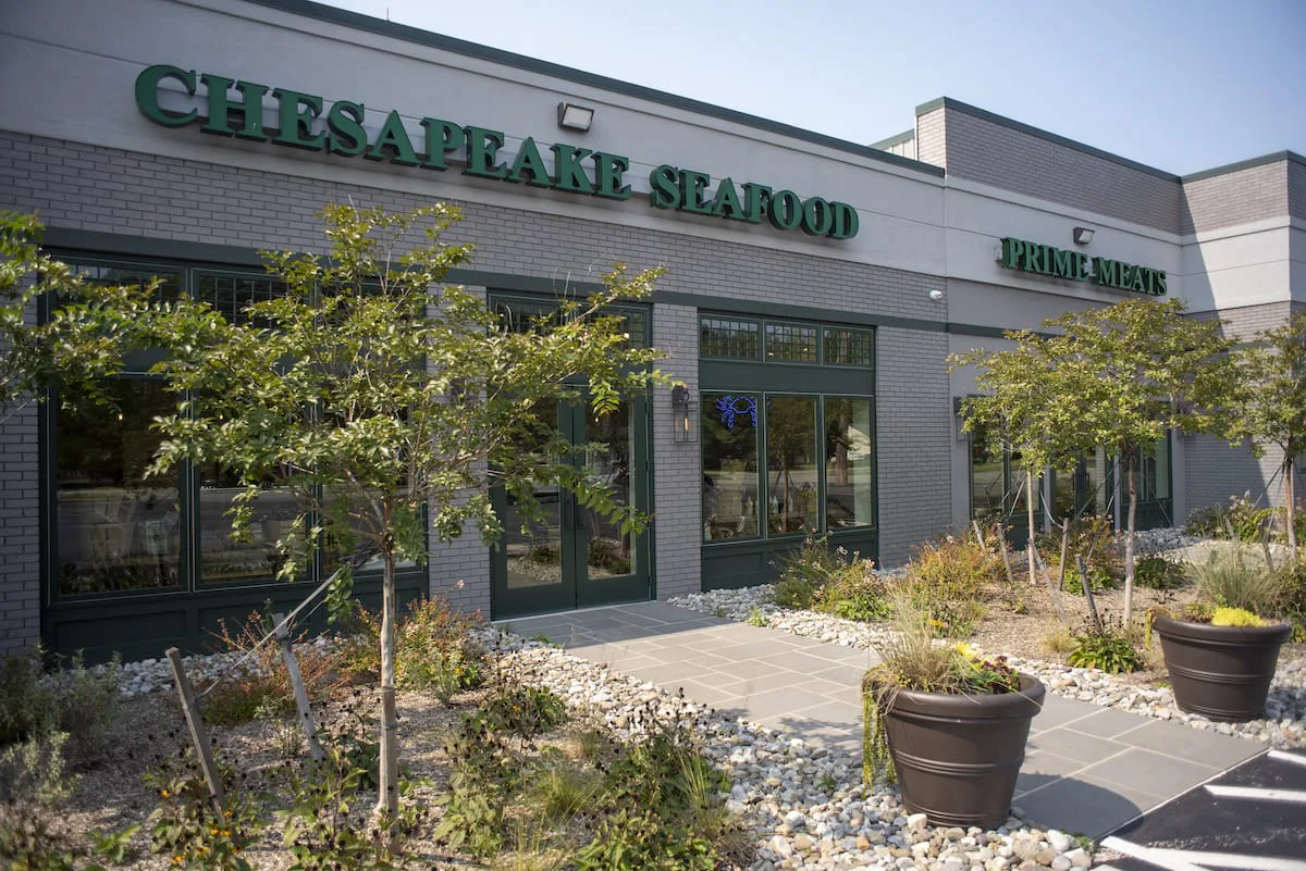 Exterior of Chesapeake Seafood store with green signage