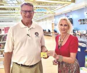 County Manager Clay Stamp with his Library Card