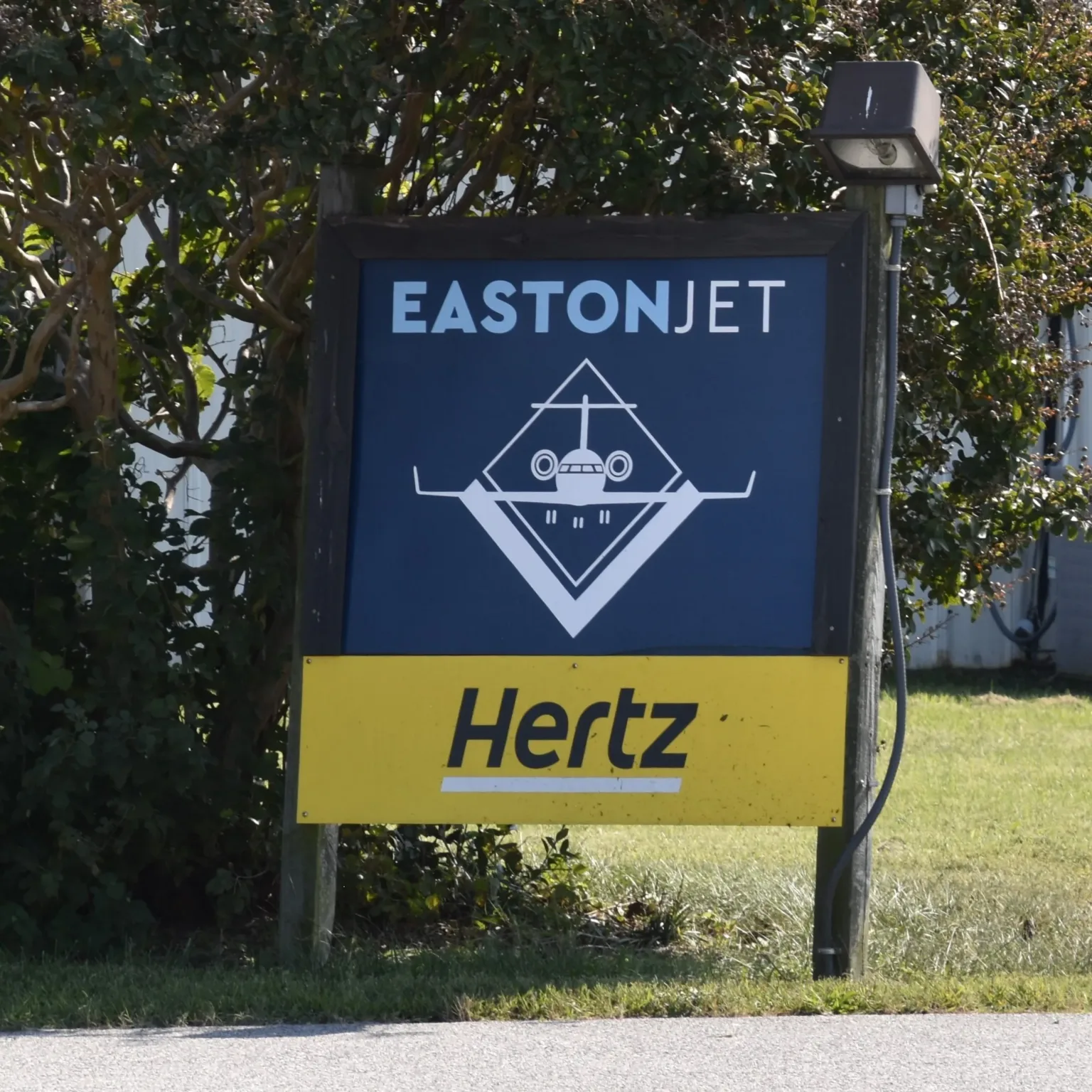 EastonJet sign with Hertz logo at an airport entrance
