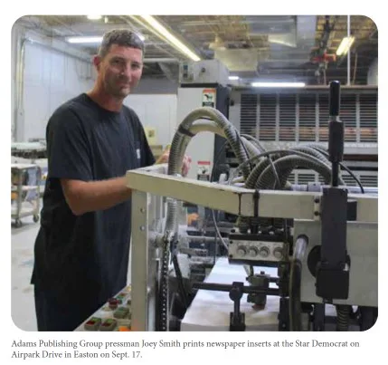 Joey Smith, Adams Publishing Group pressman, running a newspaper press at the Star Democrat