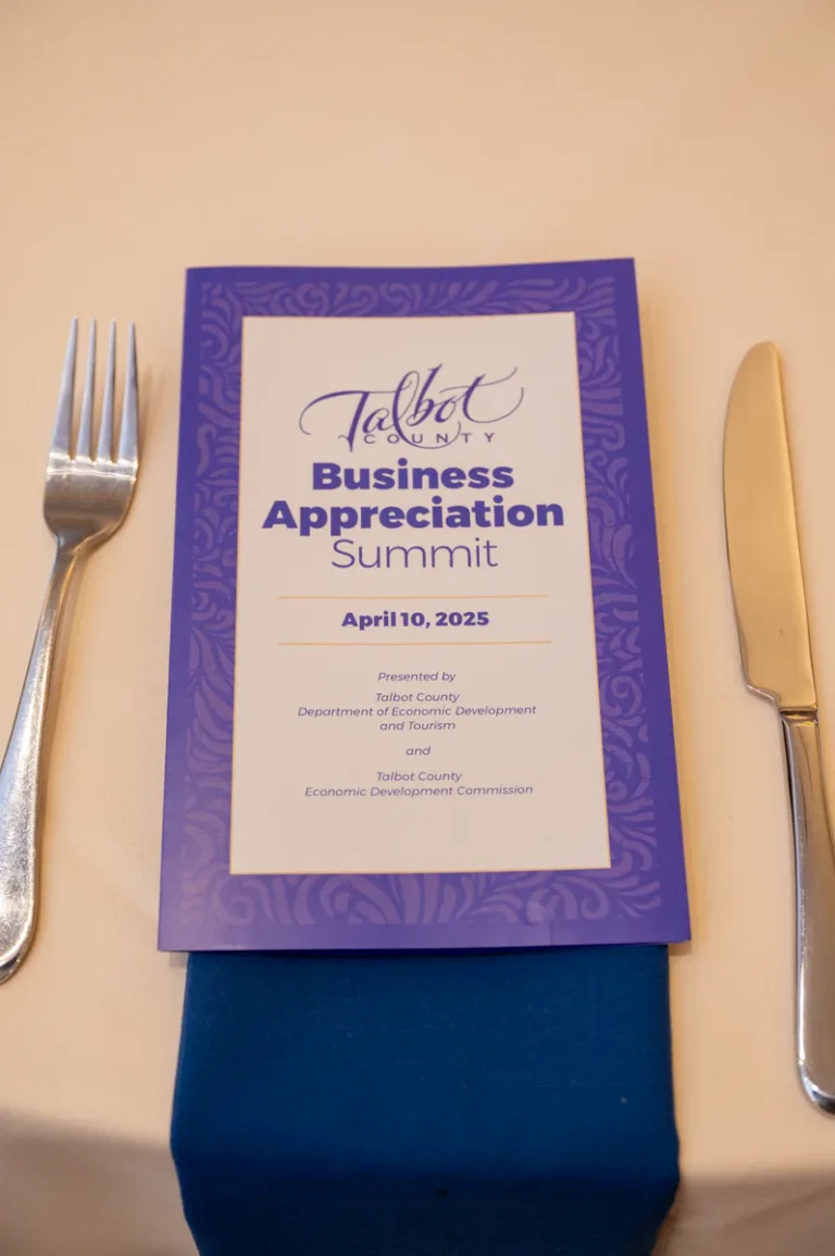 Talbot Business Appreciation Summit menu card with April 10, 2025 date on a place setting
