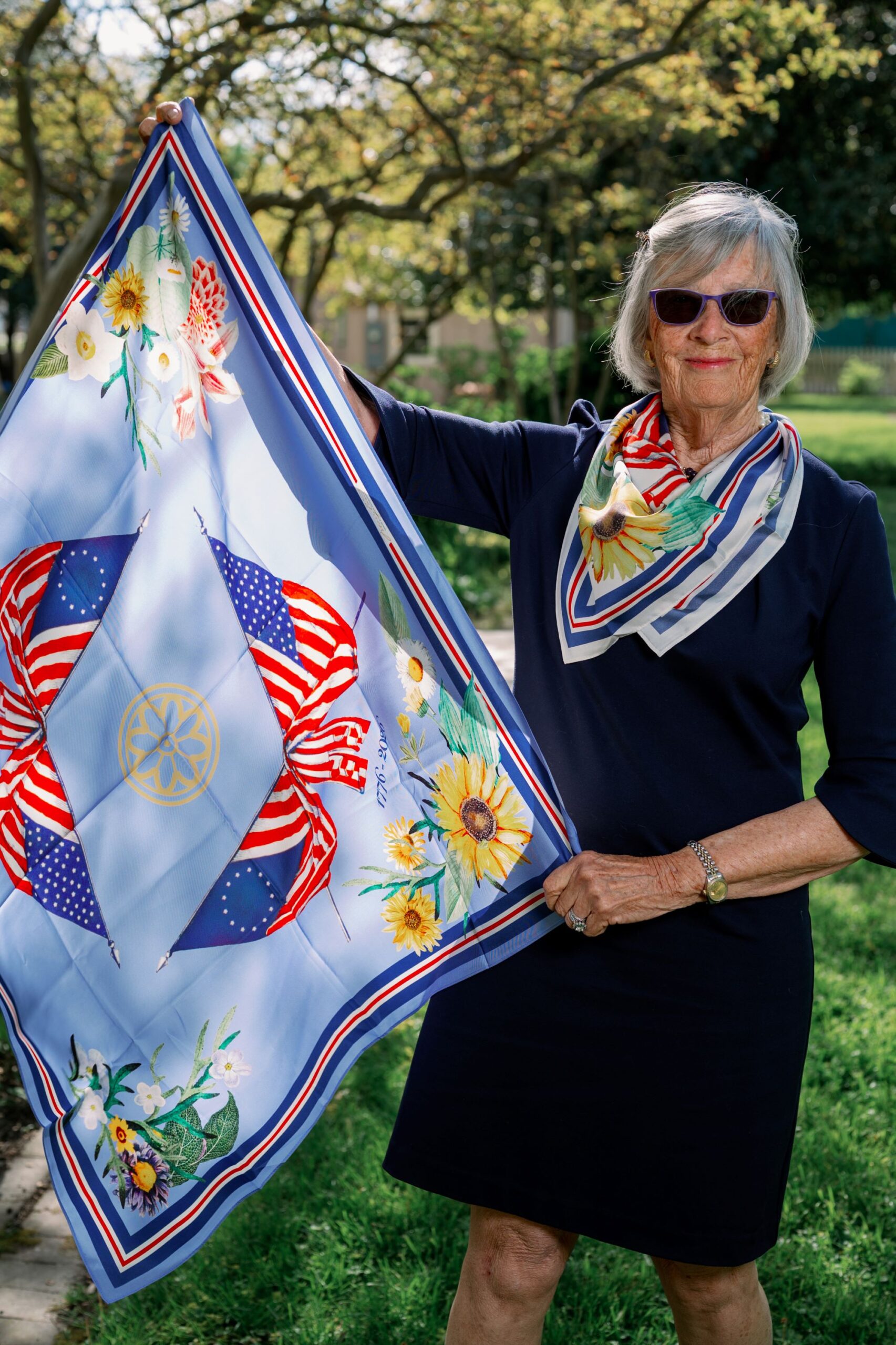 Caroline Benson holding a scarf