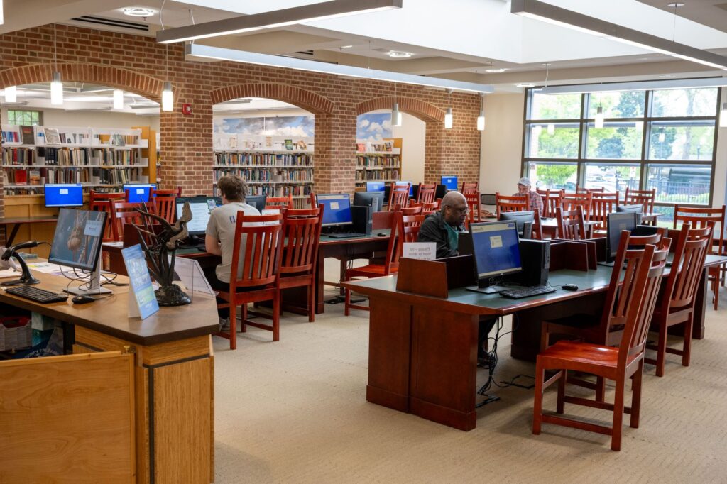 People sitting at desks at the Talbot County Free Library