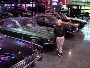 A photo of Dave Wilson in his car garage, DHW Holdings, Inc.