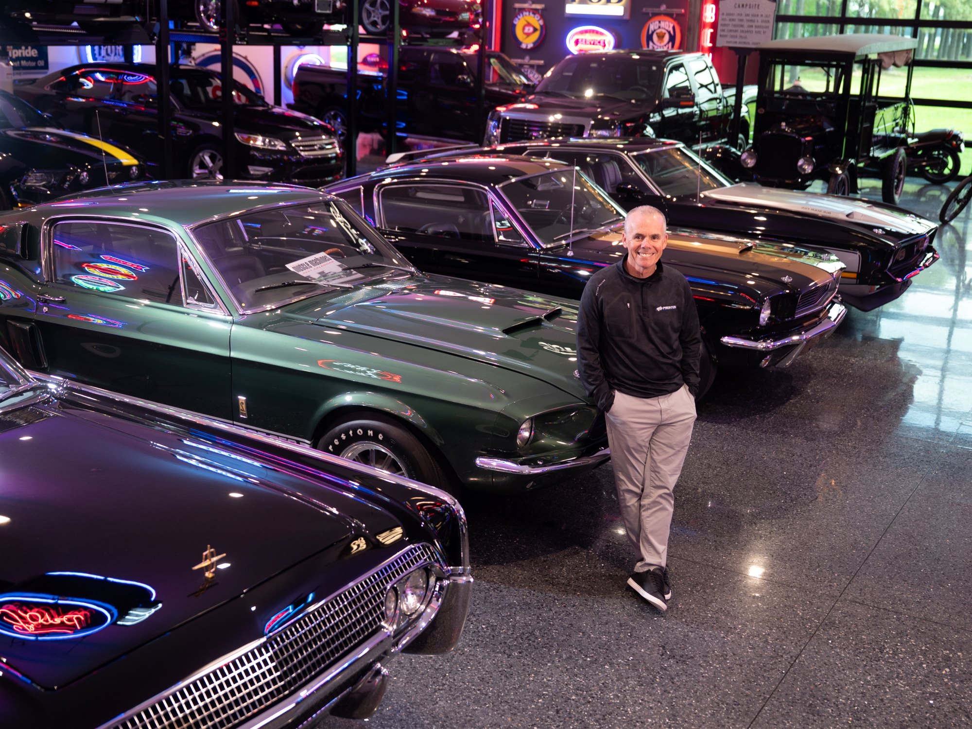 A photo of Dave Wilson in his car garage, DHW Holdings, Inc.