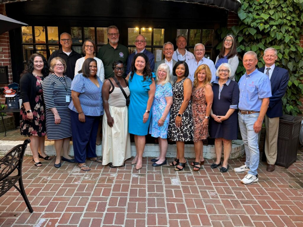 Group photo of Cassandra's guests at farewell reception