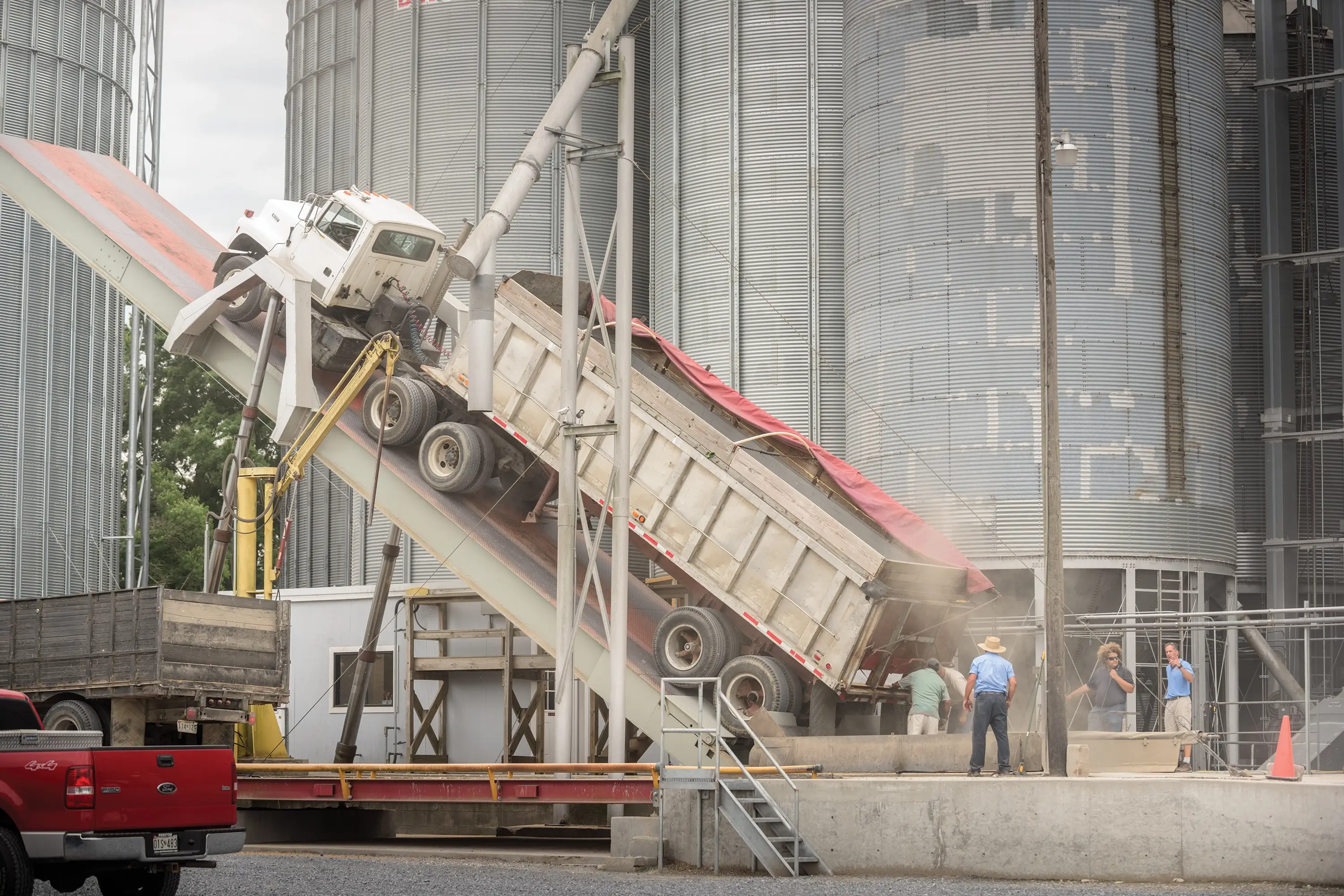 A truck on a lift being emptied